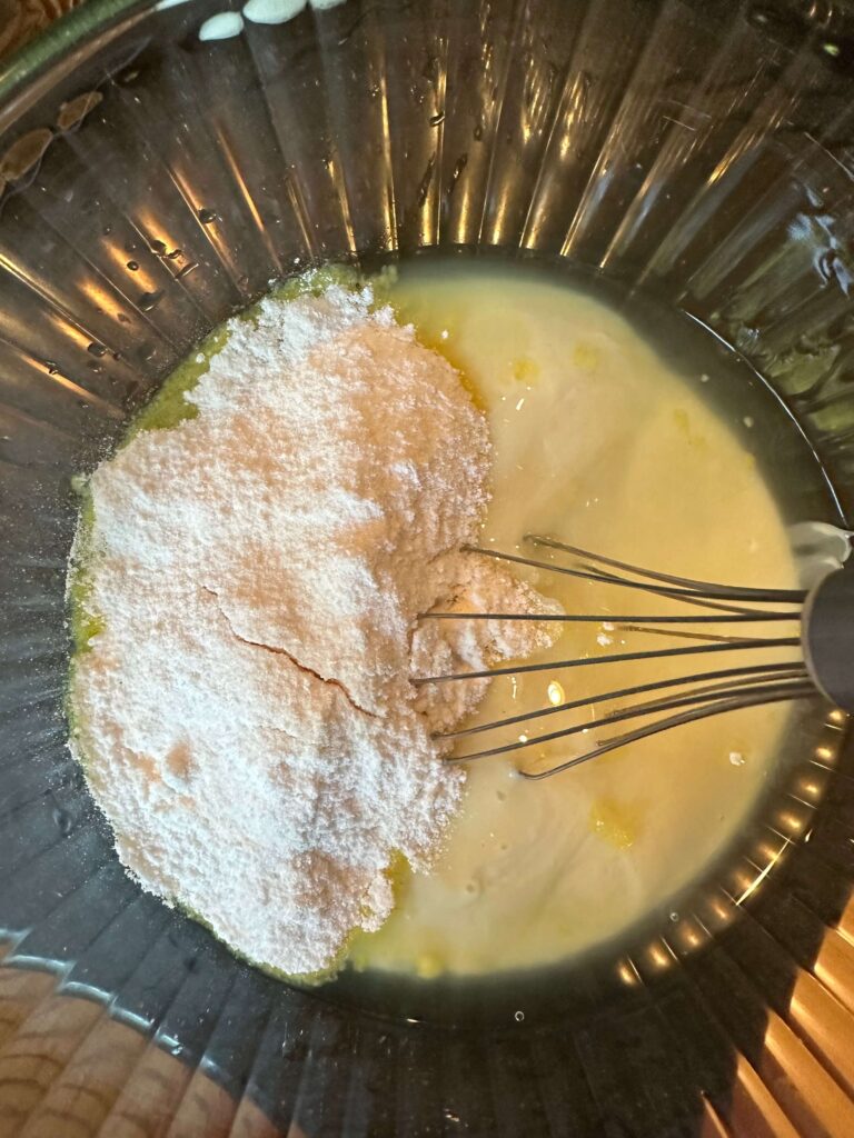 pudding mix, water, and condensed milk in a bowl