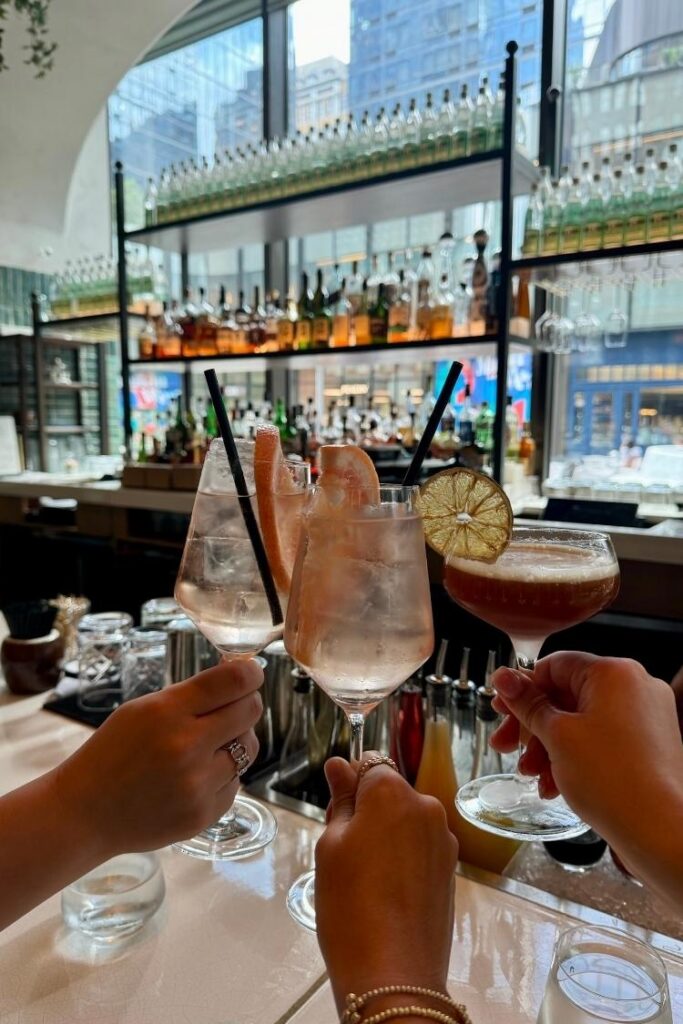 cheersying drinks in NYC