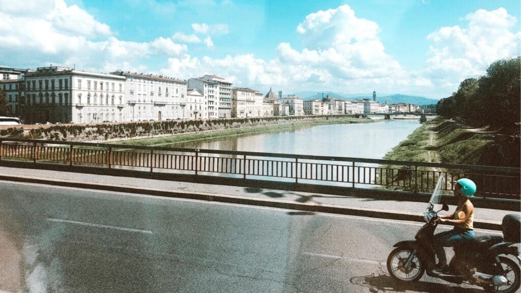 moped across the bridge in Florence