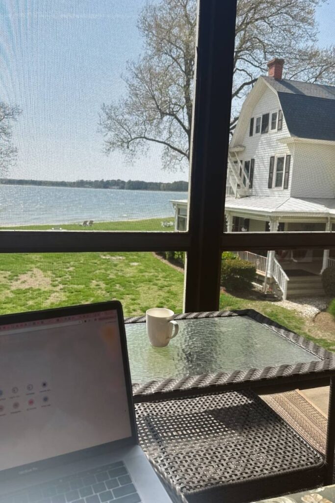 Working on laptop on the back deck at Sandaway Suites and Beach