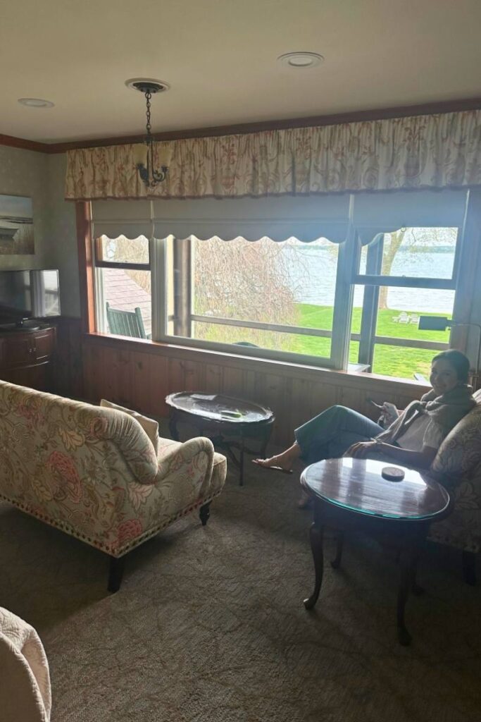Camille sitting at Sandaway Suites & Beach